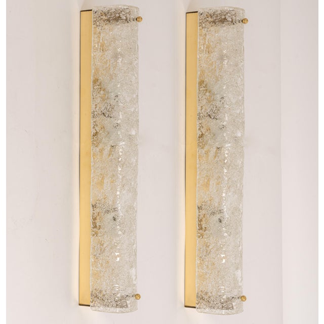 Pair of large handcrafted murano glass on a brass base sconces by hillebrand, germany, circa 1960s. It consists of...