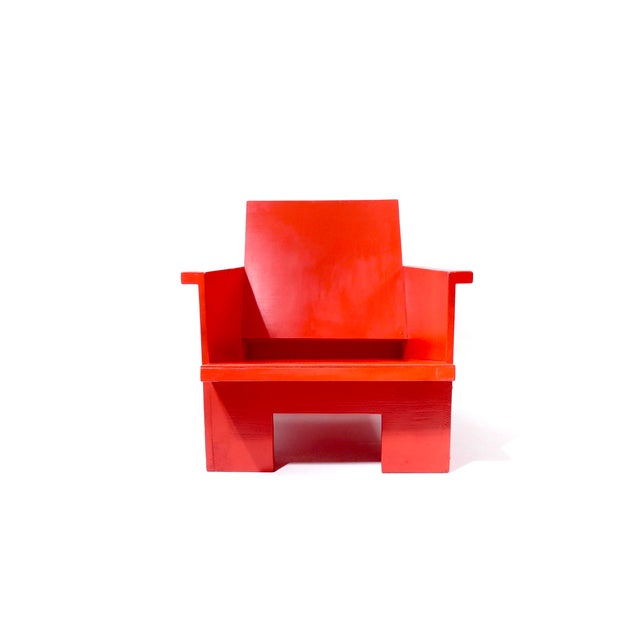 Unfortunately, the designer and builder of this striking, red-painted wooden armchair is unknown. It originates from the...