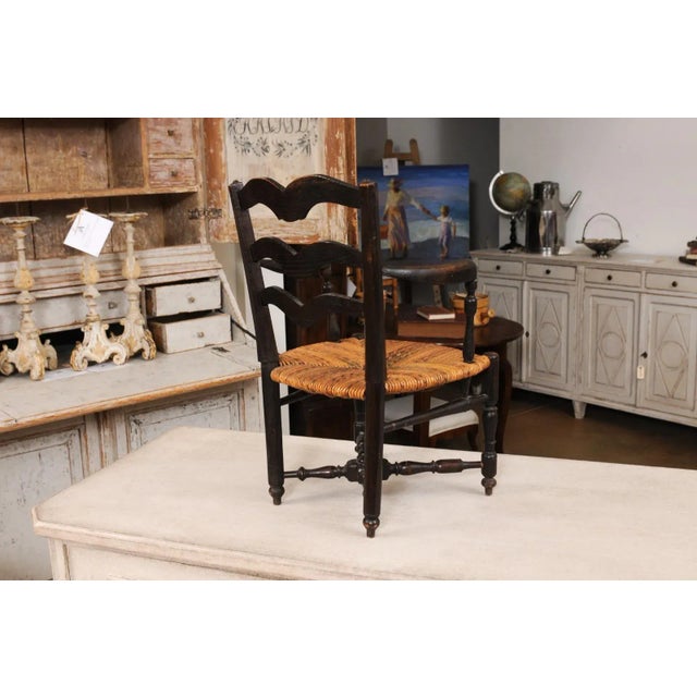 French Rustic Dark Oak 19th Century Child's Chair with Ladder Back and Rush Seat For Sale - Image 11 of 12