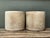 This pair of vintage cement planters offers a compelling blend of architectural structure and rustic texture. Each vessel...
