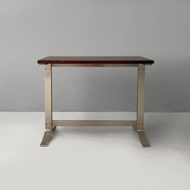 Italian modern wood and steel desk by Formanova, 1970s Desk with rectangular wooden top. The table structure, composed of...