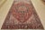 This authentic vintage traditional tribal Heriz rug is hand-knotted with fine wool and natural dyes. This oriental rug...