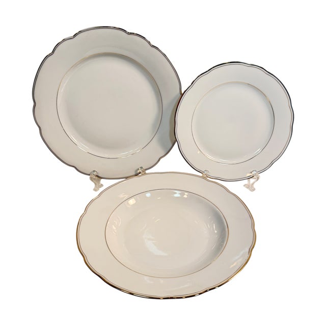 This is a coordinated collection of 40 pieces of German Bavarian porcelain china featuring white grounds, gently scalloped...