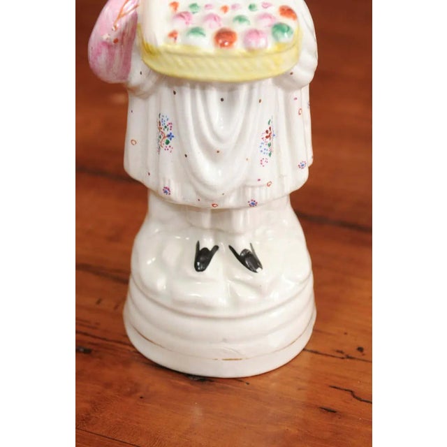 Early 20th Century English Porcelain Decorative Object Depicting Lady With a Floral Basket For Sale In Atlanta - Image 6 of 12