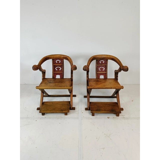 A beautiful set of two chairs, highly decorative hand carved throne chair with feet support. Typically before the 60s, the...