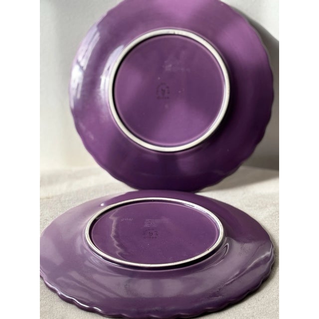 Charming vintage tea serving set by The Haldon Group, featuring two teapots and two matching platters. This coordinated...