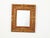 A French Tramp Art mirror from the early 20th century, with raised rosettes and ornate brass accents. Created in France at...