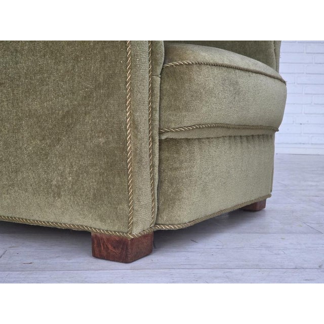 1960s, Danish relax armchair. Original green furniture velour, brass springs in the seat, beech wood legs. Original good...