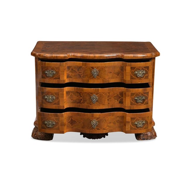 Rare Baroque chest of drawers, Braunschweig, circa 1740; walnut with finely crafted scrollwork; original hardware and...