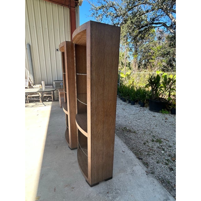 Boldly beautiful bow front cabinets perfect for displaying your favorite decorative collection, oak veneered with cerusing...
