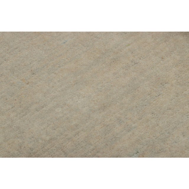 Made with hand-knotted wool, this 3x3 contemporary square rug is a rich new addition to Rug & Kilim’s Textural rug...