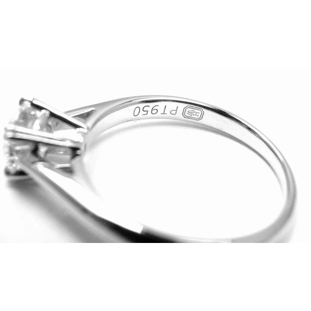 Harry Winston Platinum .56ct VVS1/F Diamond Solitaire Engagement Ring Metal: Platinum Size: 3.5 Weight: 2.9 grams Stones:...