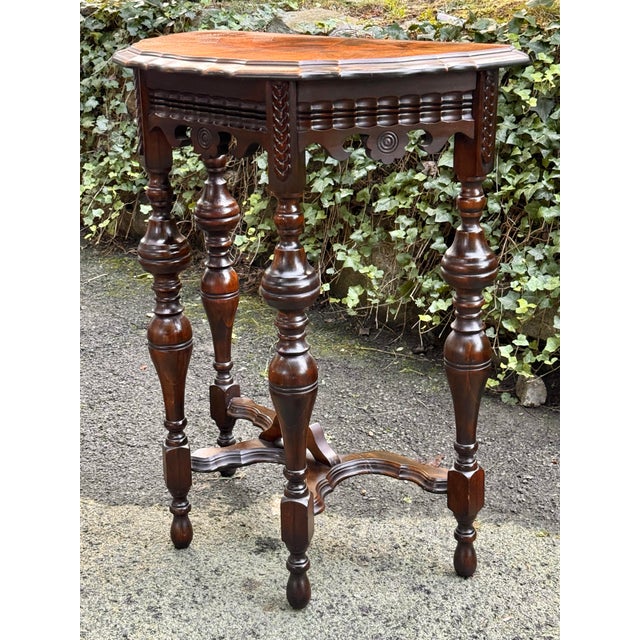 Beautiful Jacobean Demi lune table is perfect to fit in tight spaces with its undersized dimensions. Features a stunning...