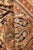 This antique Persian rug is a paragon of the northwestern Malayer style. Its main field carries a masculine paisley design...