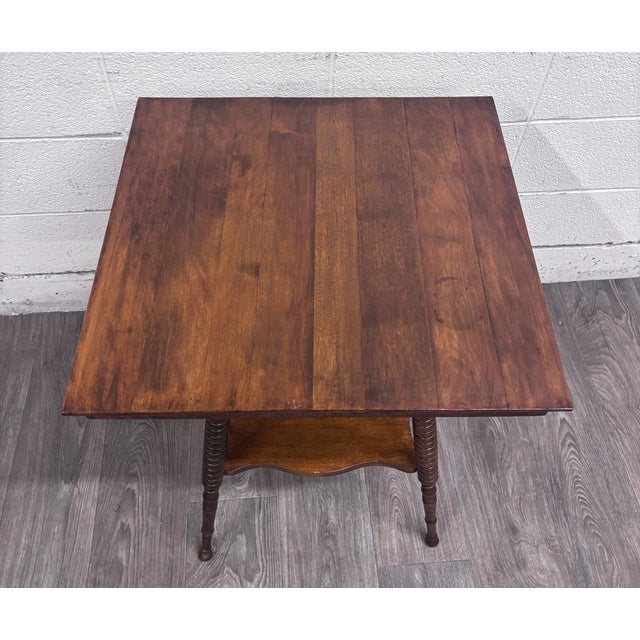 This is a stunning antique Victorian solid mahogany side or lamp table featuring a square plank top, four spiral rope-...