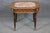 This exquisite antique French side table showcases the timeless elegance of early 20th -century craftsmanship, featuring a...