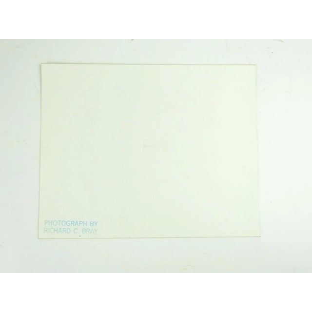 Vintage 1970's abstract overlaid tracks and man photograph on paper by Richard C. Bray (20th century). Artist stamp on...