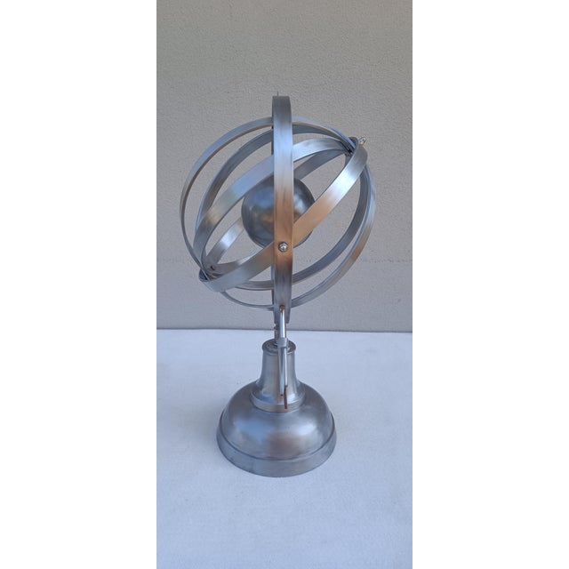 Armillary sphere in metal, Italian manufacture from the 1960s/70s. Object in good condition with slight signs of use over...