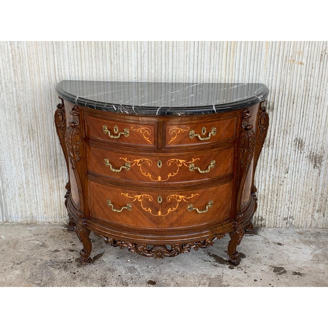 20th century French pair of carved and marquetry nightstands with two doors and hidden drawer Beautiful pair of carved...