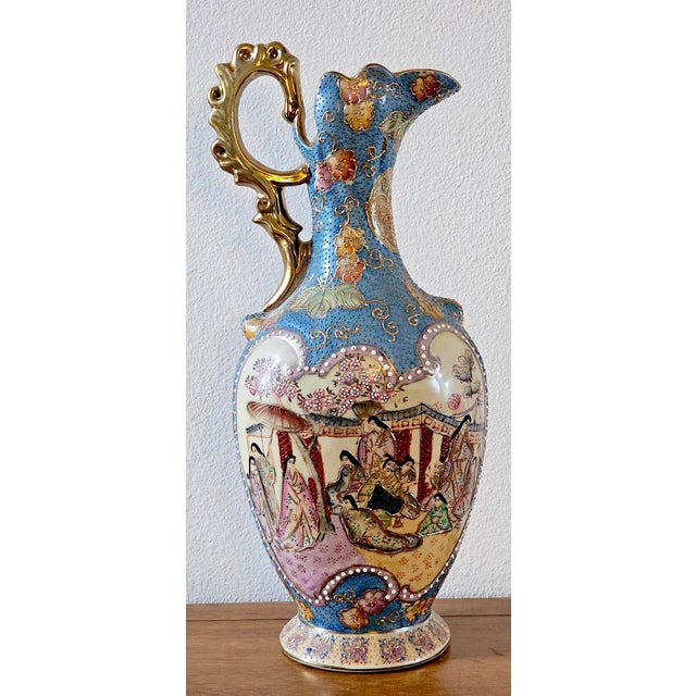 A stunning and highly decorative vintage Satsuma-style vase pitcher, beautifully hand-painted and featuring an elegant...
