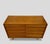 Functional mid-century chest of drawers with clean lines and practical storage, designed for everyday use. Designed by...
