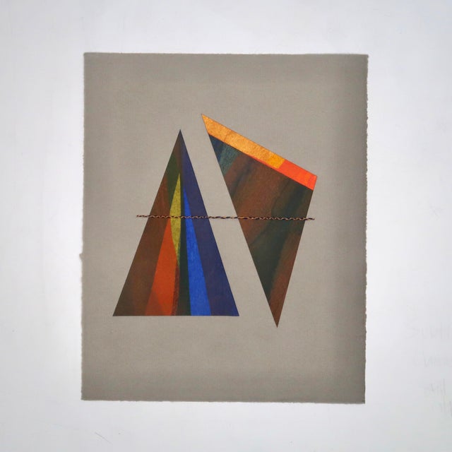 This one-of-a-kind work juxtaposes angular forms, layered color, and negative space against handmade grey paper. Deep...