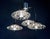Elegant mid-century modern sputnik flush mount with four clear bubbled murano glasses on a chromed frame. Star-shaped...