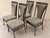 Wrought iron is all the rage these days, and these vintage dining chairs prove exactly why. The set of four stands tall...