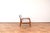 This armchair was designed in the 1960s by Illum Wikkelsø. The lounge chair frame is made of cherry wood and has has been...