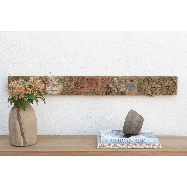 Uncover a piece of history with this authentic architectural carving, salvaged from the structures of 19th-century India....