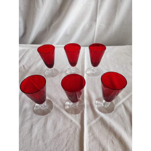 Great vintage set of six small cordials ruby red and clear stems.
