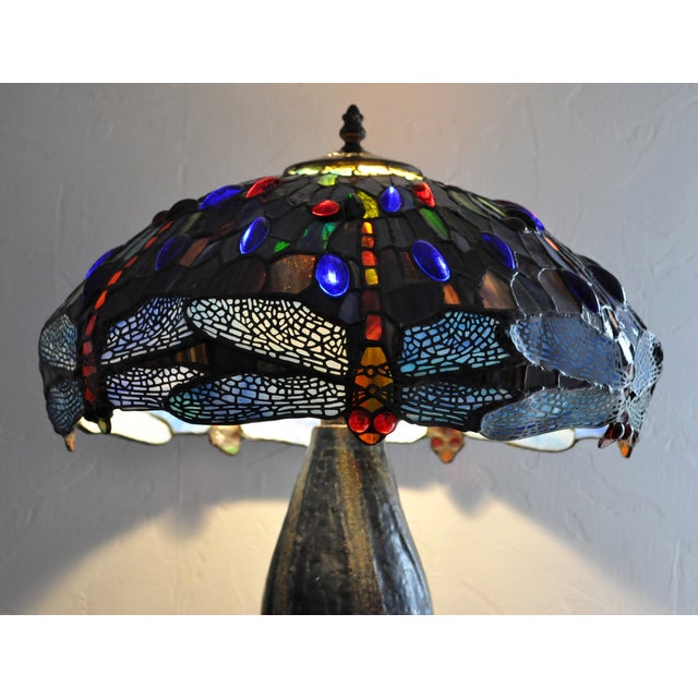 Henri Javaux Tiffany style lamp, sandstone foot The whole in good general condition Height 62 cm Diameter 42 cm This piece...