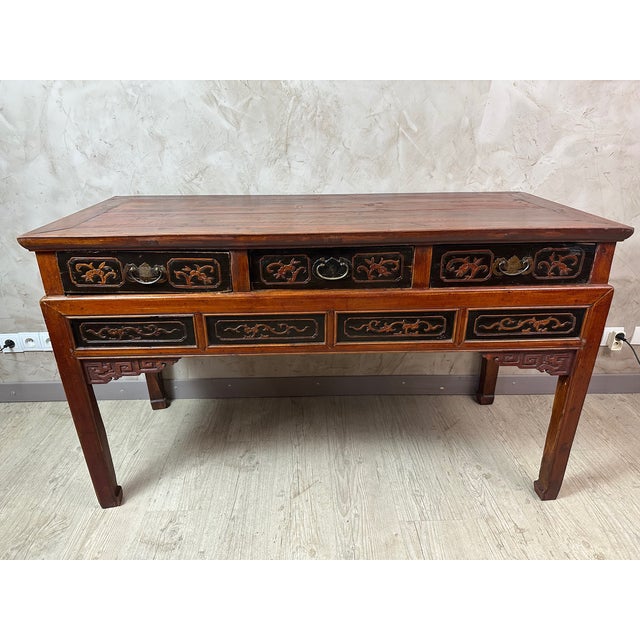 Pretty Chinese console dating from the end of the 19th century in Chippendale style, featuring three good-sized drawers...
