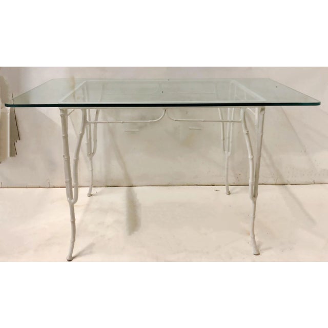 1960s Chinese Chippendale patio set with table and four chairs. Upholstery is a new black and white indoor outdoor fabric....