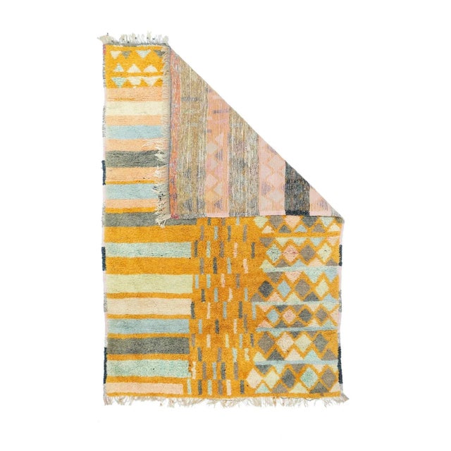 Three rugs in one. Horizontal bands, a central golden river of dashes and a side panel of rows of lozenges. Black bands...