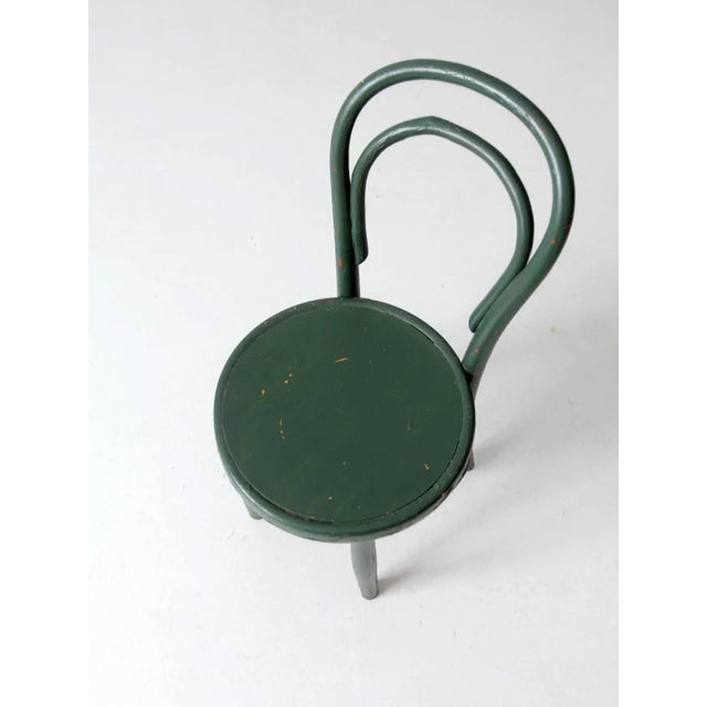 This Great Northern Chair Company children's bentwood chair adds a touch of vintage charm and a pop of color to any home....