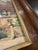 Charming vintage watercolor depicting a picturesque European village or townscape, rendered in a loose, expressive style...