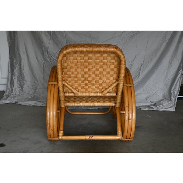 Classic Tropical inspired Pretzel Chair born in the 1950's in the Philippine Islands. Brought into the US by a merchant...