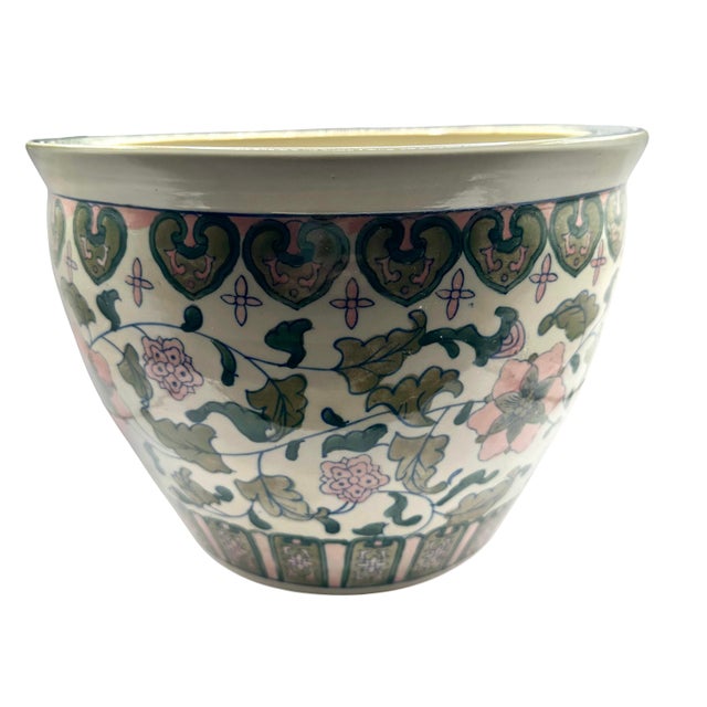 Vintage Asian fish bowl planter with lotus flowers in famille rose pattern. This decorative planter is the perfect plant...