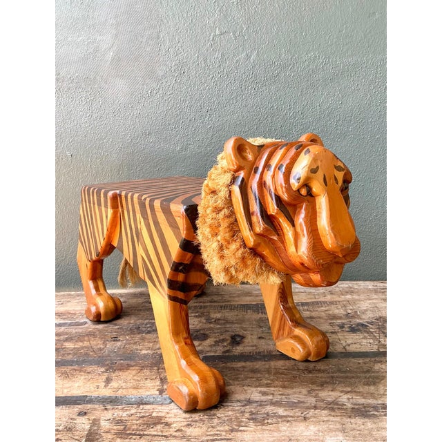 This vintage handcrafted tiger stool is a delightful fusion of Folk Art craftsmanship and functional design, bringing...