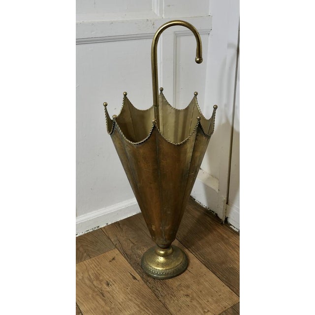 Umbrella Shaped Brass Umbrella Stand An unusual and attractive piece, made in brass in the shape of an open umbrella The...