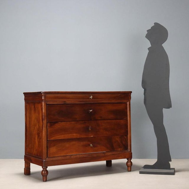 Cappuccino walnut chest of drawers. Four drawers in the front, the first of which is in the band under the top. Turned...