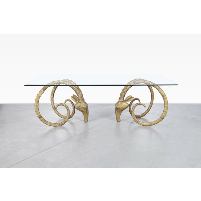 An extraordinary statement in sculptural design, this vintage brass ibex ram’s head dining table base set was crafted in...