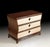 Handcrafted in Italy, this contemporary nightstand features rich Makassar ebony veneers with dramatic grain patterns that...