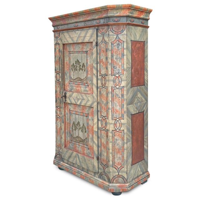 Painted Wardrobe Dated 1812 Antique Tyrolean cupboard from the early 19th century, made of fir wood and decorated in the...