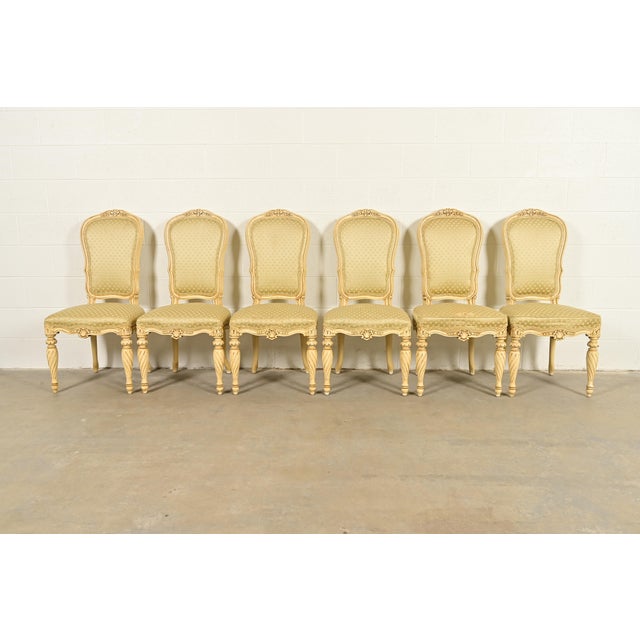 A gorgeous set of six French Regency Louis XVI style dining chairs By Karges Furniture USA, Circa 1960s Beautiful carved...