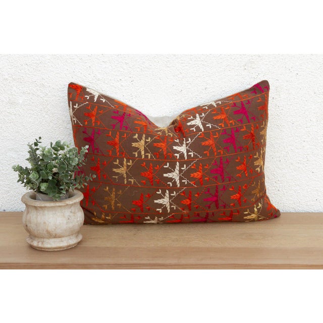 This 16x24 inch lumbar pillow is a breathtaking study in Antique Indian Folk Art, handcrafted from a salvaged Punjabi...