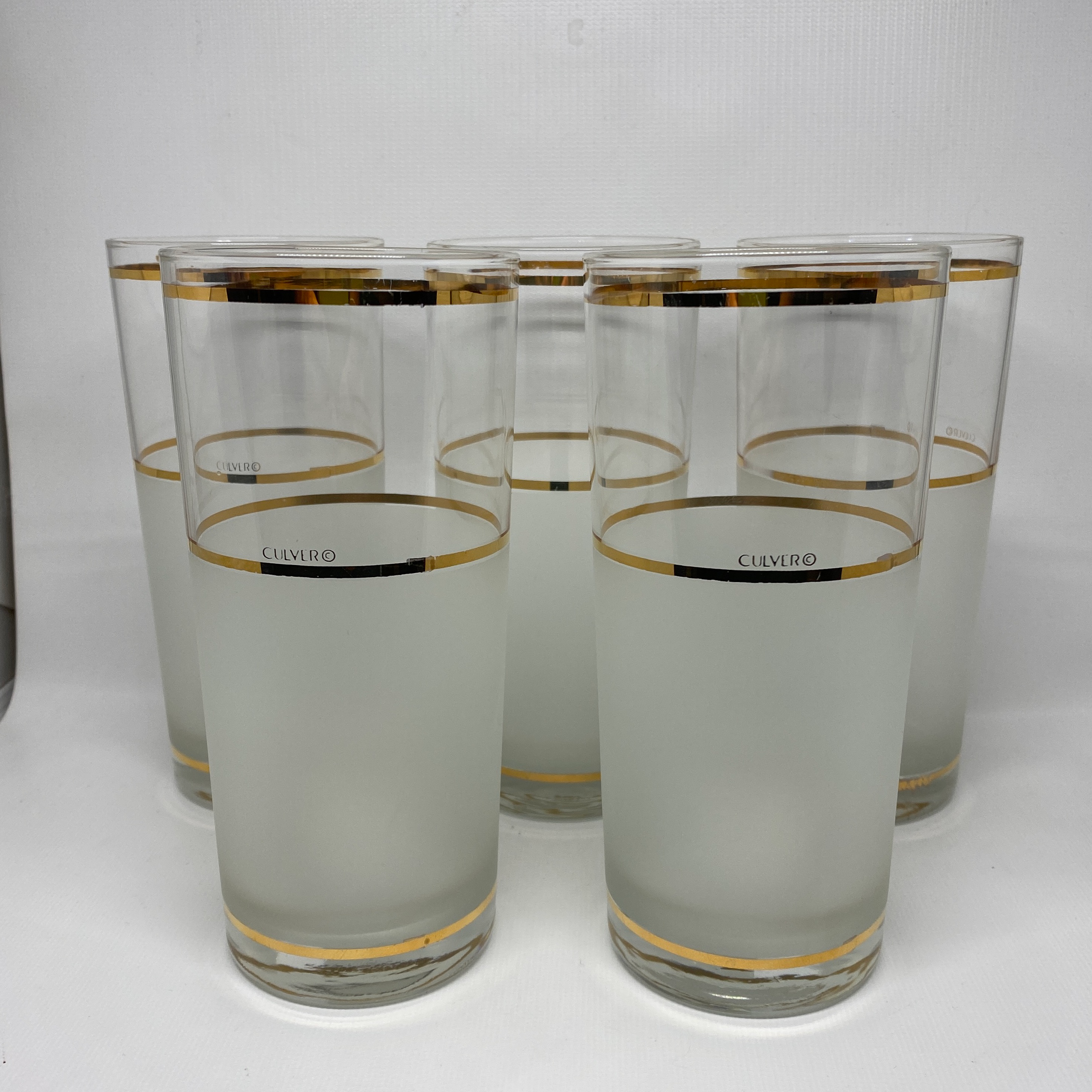 clear glasses with gold trim