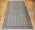 The early 20th century Turkish Hereke room size rug, beautifully hand-woven in the early 1900s. This rug features a...