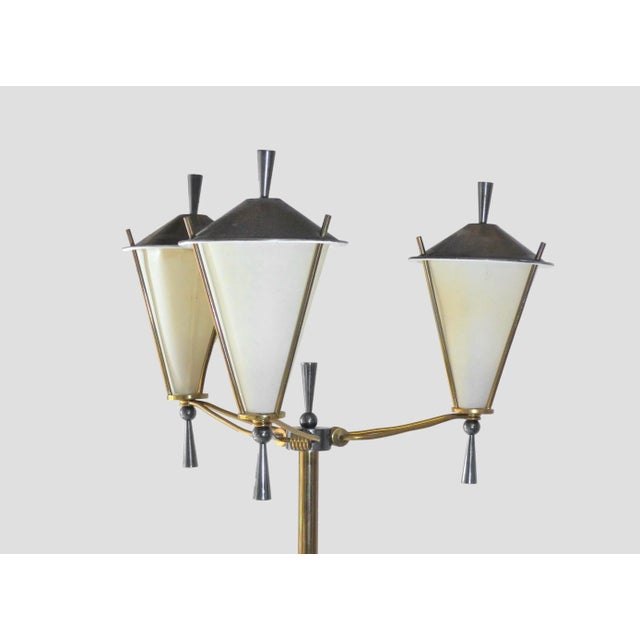 Charming floor lamp attributed to the House of Arlus, gilded brass and gunmetal patina, covered with green leatherette for...